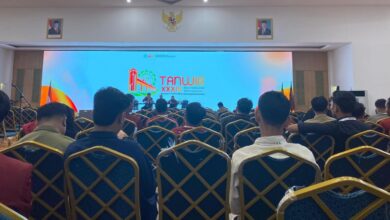 Suasana forum Tanwir XXXIV IMM di Banten yang memperlihatkan peserta sidang dan layar videotron berlogo Tanwir XXXIV.