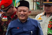 Iskandar Muda Hasibuan tersenyum saat menghadiri kegiatan konsolidasi internal Majelis Dikdasmen PWM Aceh di Bener Meriah.