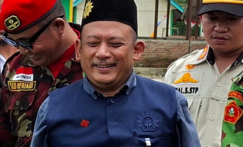 Iskandar Muda Hasibuan tersenyum saat menghadiri kegiatan konsolidasi internal Majelis Dikdasmen PWM Aceh di Bener Meriah.